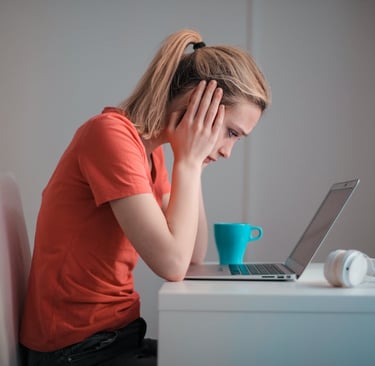 Photo by Andrea Piacquadio: https://www.pexels.com/photo/young-troubled-woman-using-laptop-at-home-3