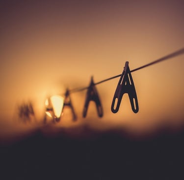 Photo by Santosh Maharjan: https://www.pexels.com/photo/shallow-focus-photography-of-wooden-clothes-