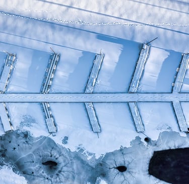 Photo by Tom Fisk: https://www.pexels.com/photo/aerial-view-of-a-snowed-on-industry-area-10880250/