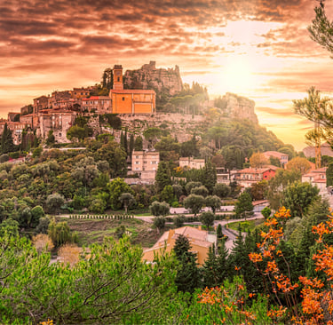 Panoramic sunset view of Eze village, a historic hilltop medieval town on the French Riviera.
