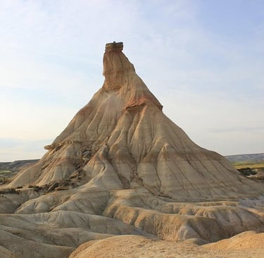 The Castildetierra rock formation rises from the desert landscape of Bardenas Reales Natural Park in Spain.