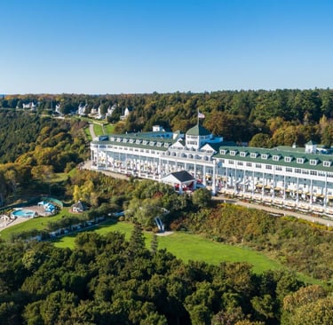 Aerial view of the historic Grand Hotel on Mackinac Island, Michigan, overlooking Lake Huron.