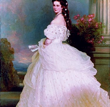 Portrait of Empress Elisabeth of Austria in a white gown with star-shaped diamonds in her hair.