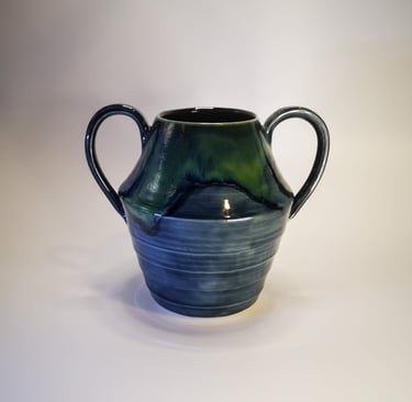 A large GonPotty vase with handles using storm and seaweed glazes