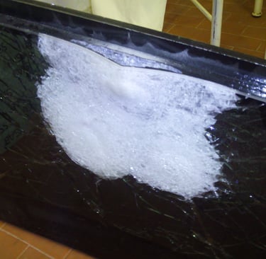 The ballistic glass withstood several shots.