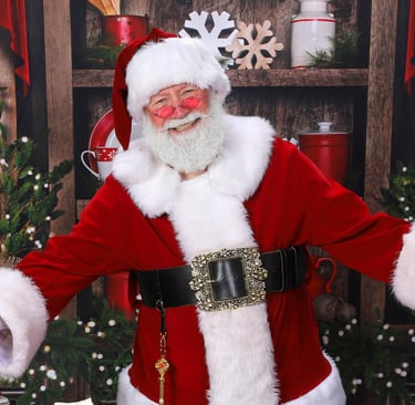 Santa Jay is smiling for the camera.