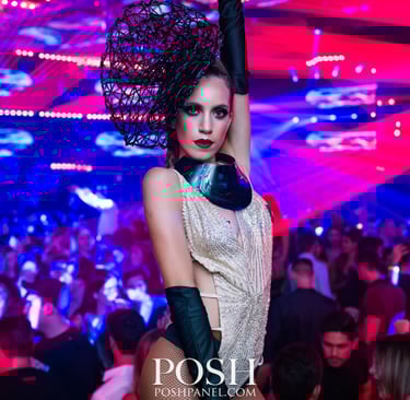 a woman in a dress and headphones at a nightclub, rico sanchez entertainment, llc
