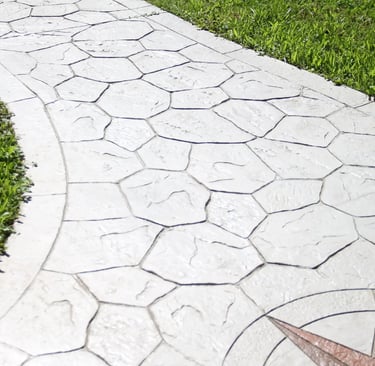 a path way with a stamped concrete