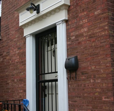 Similar custom trim for the front door. Added new porch light, too. Then painted shortly after this 