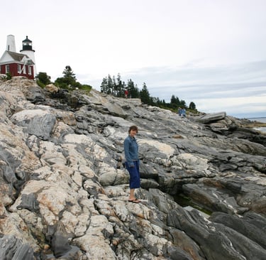 Dawn on the rocks by a lighthouse in Maine in 2007