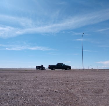 My Tacoma with our bikes on trailer at Bonneville Salt Flats in Utah on our way to Lake Tahoe