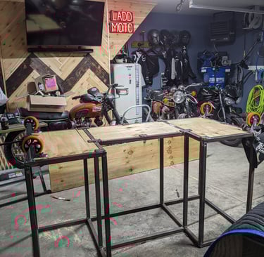 2021 - Adding wheels to the frame of the bar I welded together.