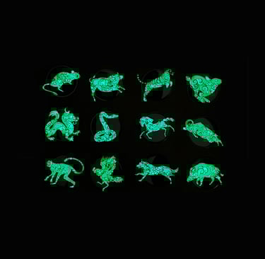 a collection of green glow - up animal figure pins