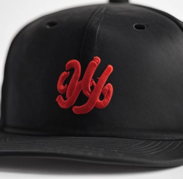 An embroidered cap featuring intricate designs.