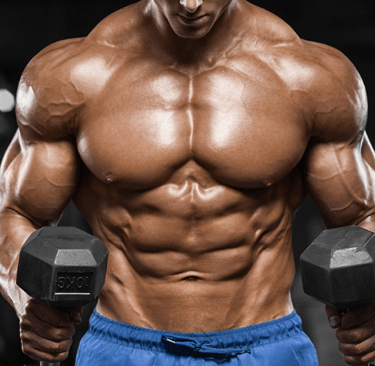 a man with a muscular body curling dumbbells