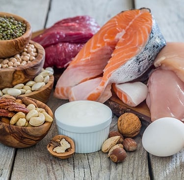 a variety of foods that include fish, eggs, and nuts