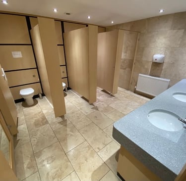 Premium beauty room amenities in Shirley Solihull including couch and entertainment screen.