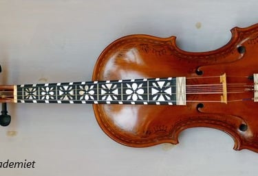 A hardanger violin with pearl inlay and rose detailing