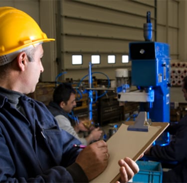 Equipment Appraiser looking at Equipment