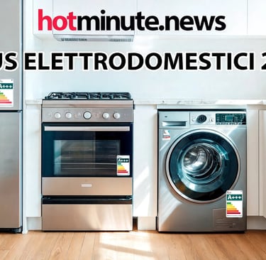 Interno cucina moderna con tre elettrodomestici in acciaio inox: frigorifero, forno a gas e lavatric
