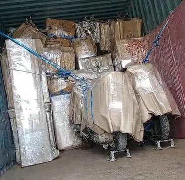 Secure household goods and bike in a transport container by Seemanchal Packers and Movers in Purnia.