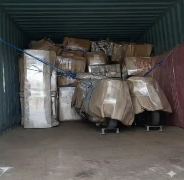 Secure household goods and bike in a transport container by Seemanchal Packers and Movers in Purnia.