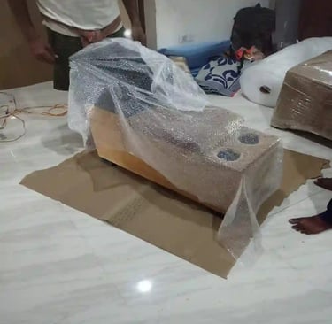 Seemanchal Packers and Movers Araria using premium bubble wrap and corrugated sheets for furniture p