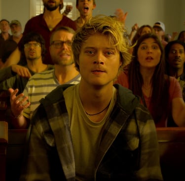 a man in a church pewing chair with a woman in a crowd of people