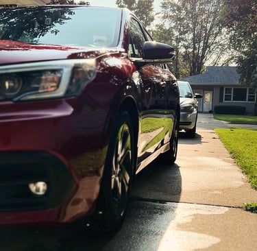 Professional mobile car wash removing grime and restoring a car’s shine