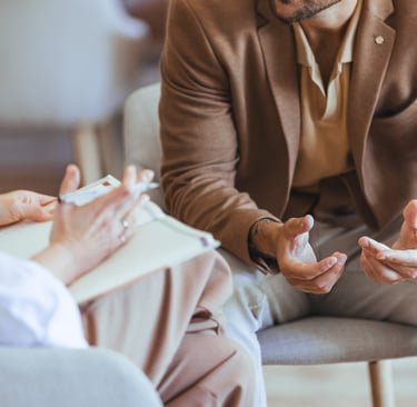 Client speaking with a wellness coach during a supportive, one-on-one session