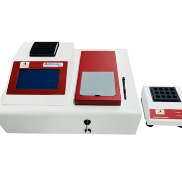 a computer screen with a cell phone and a keyboard