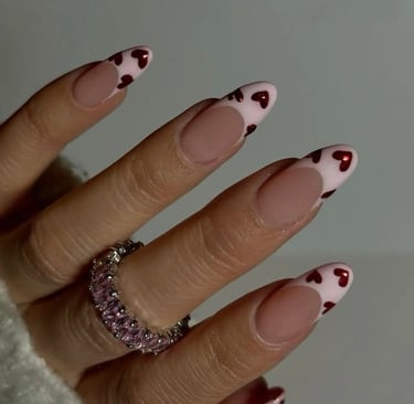 Valentine's nail inspo pink french with red chrome hearts