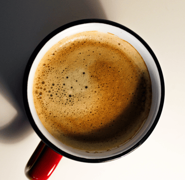 a cup of americano on the table