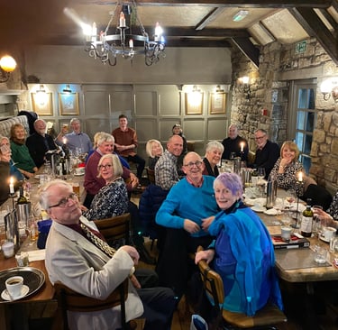 Voicemale members enjoying dinner
