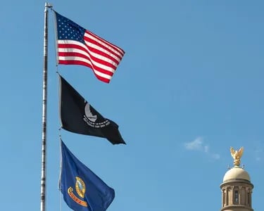 American flag raised above the capital building in Boise Idaho
