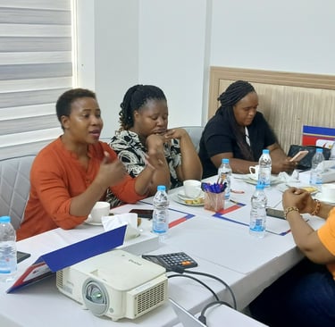 a group of people sitting around a table