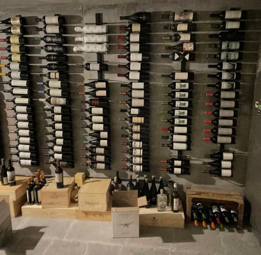 a wine rack with bottles of wine and bottles of wine