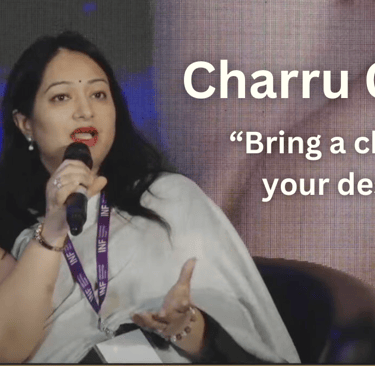 a woman in a white dress and a microphone with a message that says Charru Gupta Numerologist
