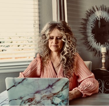 nail tech reviewing salon policies and client boundary guidelines at her workstation