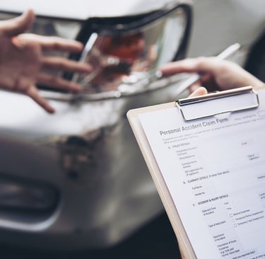 a person holding a clipboard with a clipboard attached to it discussing about an accident