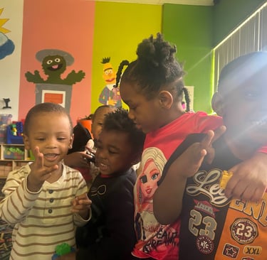 a group of children in a classroom with a teacher