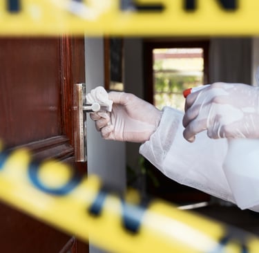 a person in a white lab coat and gloves holding a knife and a knife in