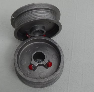 Drum for torsion spring cable.