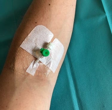 a person with a bandage on their arm and a bandage on their arm