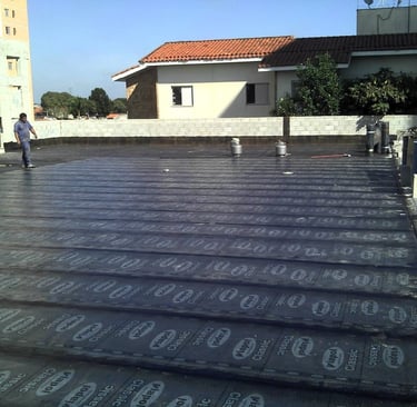 a man standing on a roof top with a lot of numbers on it