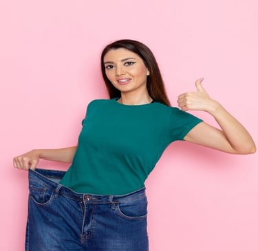 A girl holding her jeans