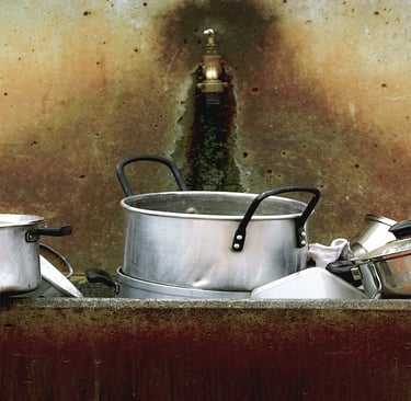 Dirty Cooking Utensils in sink