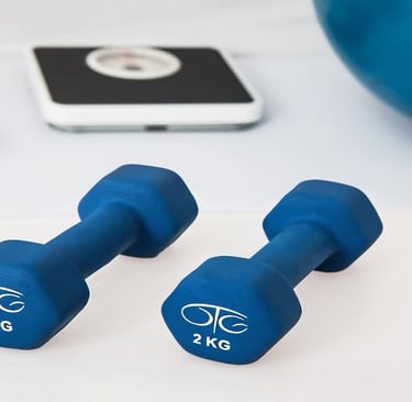 Dumbbells and weighing scale