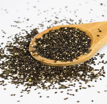 Chia seeds in a wooden spatula