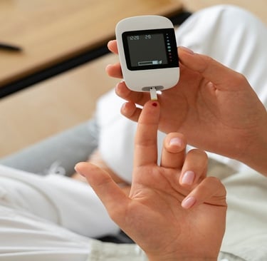 A girl checking her blood sugar